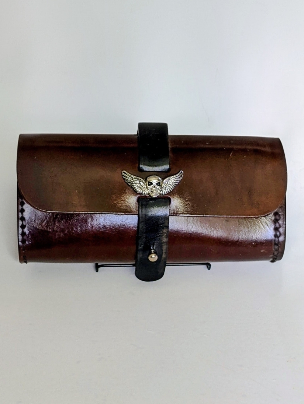 Handcrafted Leather Motorcycle Handlebar Bag with Winged Skull Accent